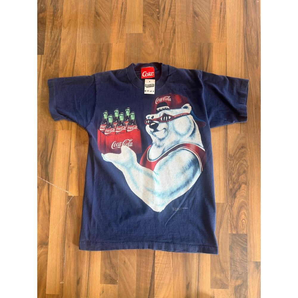 1996 Coke flexing a six pack size Medium